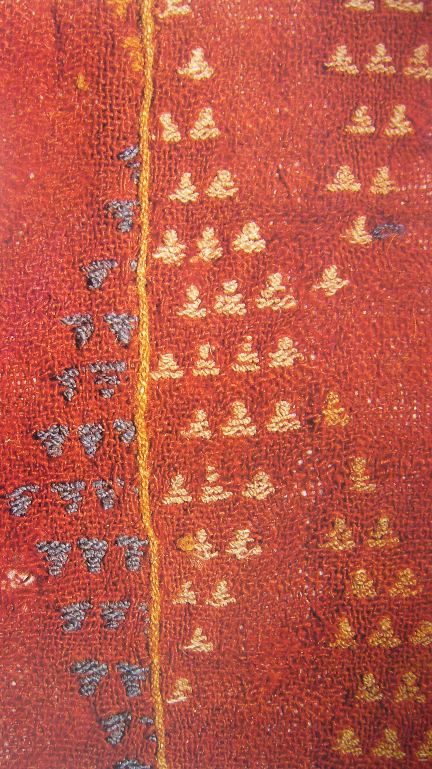 FIG. 12 Woolen embroidery with running stitch of the Western Zhou Dynasty preserved in the Museum of Xinjiang Uygur Autonomous Region.